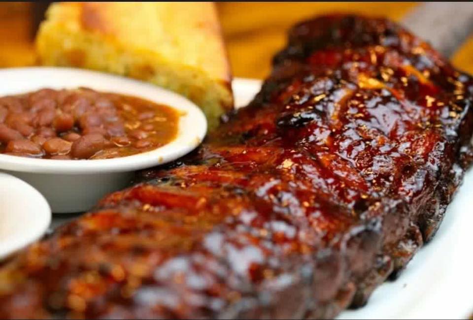 Rack of ribs and sides plated at bonos bbq
