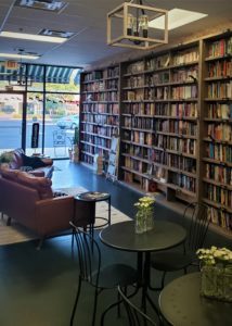 Colorized book wall at Present Tense - Green Cove Springs FL