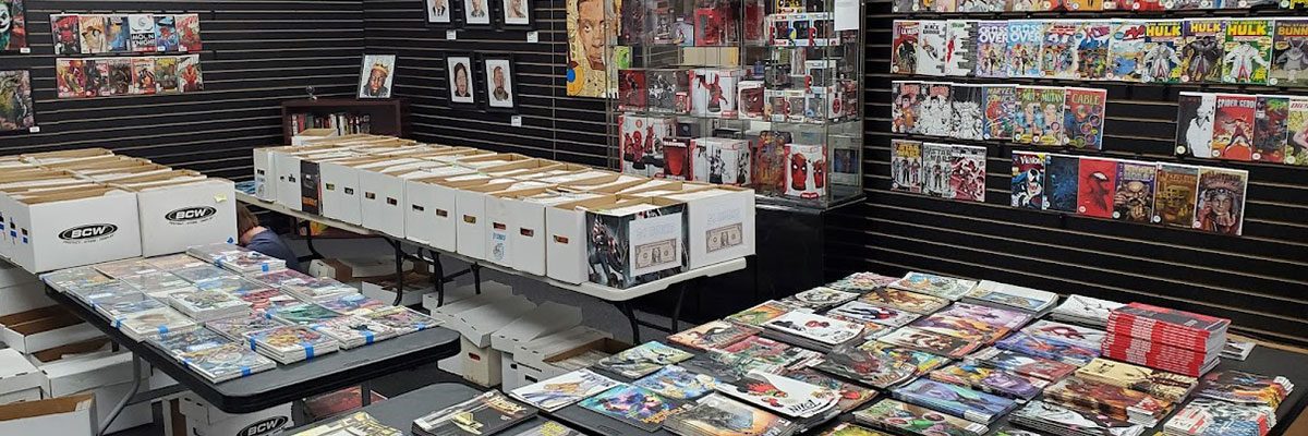 comic books and cards on a table