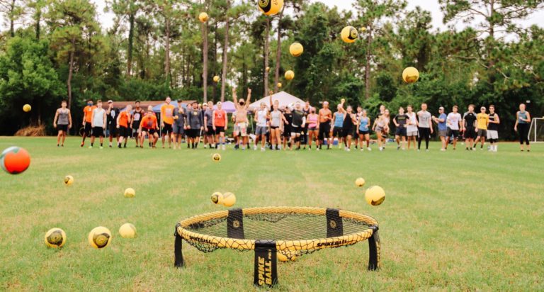 Florida Roundnet Open 2023. Group of competitors behind a Roundnet net.