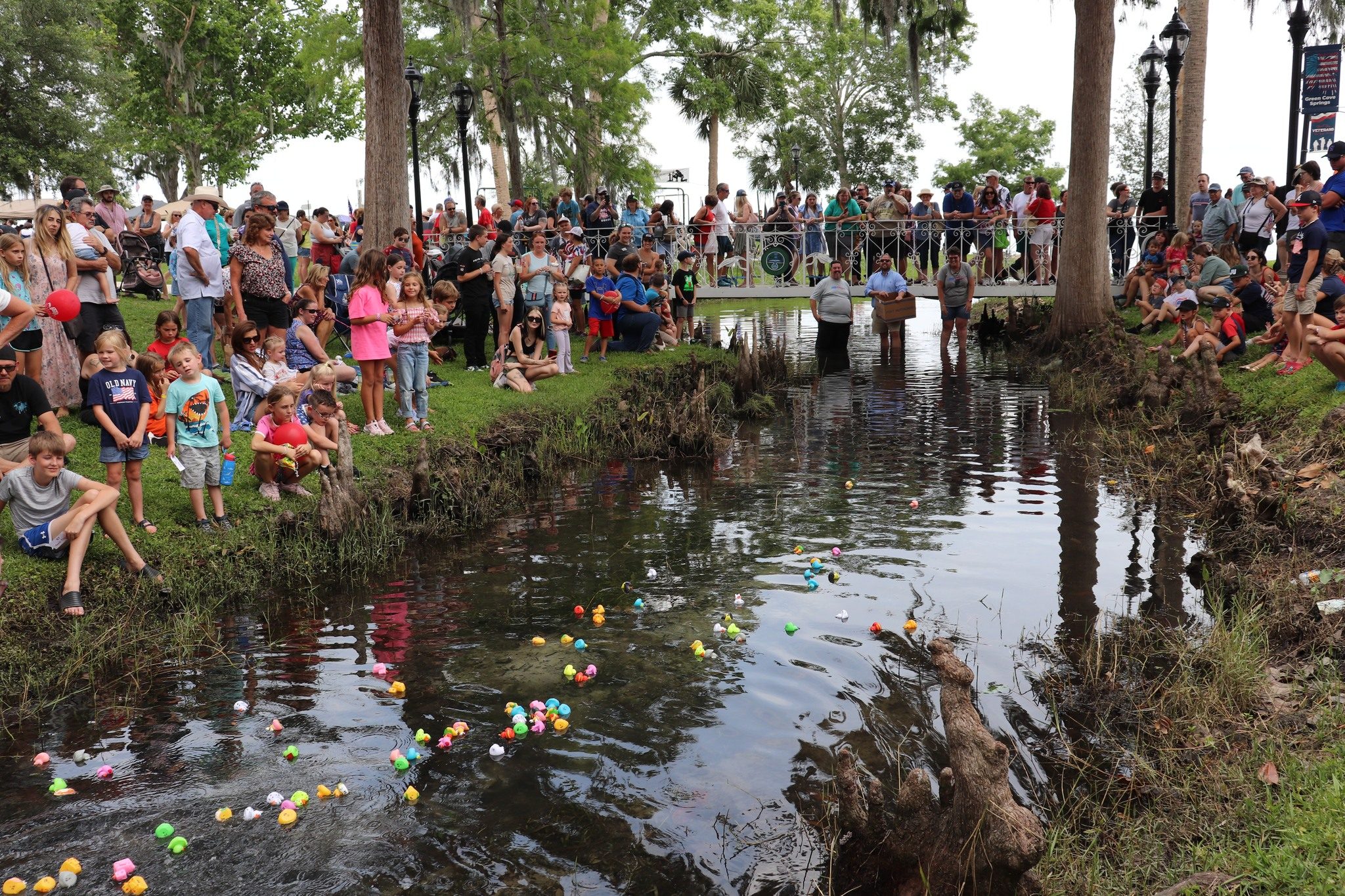 People gathered at Riverfest Duck Race