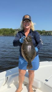 Misty Wells shows off her catch in Clay County