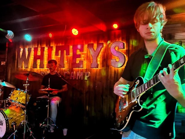 Guitarist playing music at Whitey's Fish Camp in Fleming Island, Florida